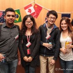 Students in front of various country flags