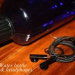 water bottle and headphones