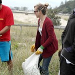 Volunteers weeding at Beach Care