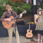 Acoustic band doing a gig in the market.