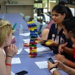 Mates playing Uno Stacko