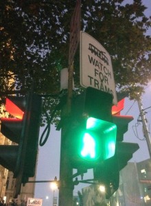 Green man lit up at traffic crossing