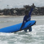 Tharshika is triumphant - she successfully surfed!