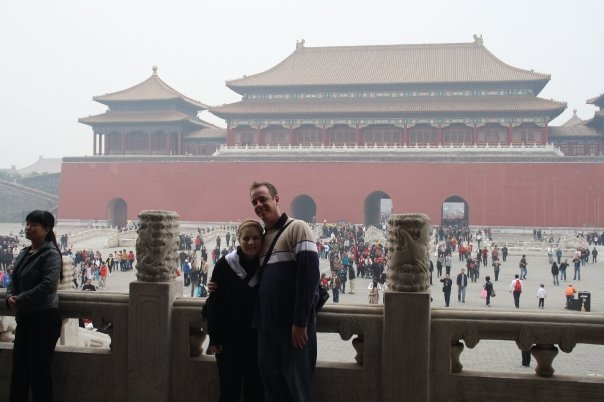 Alexis and brother in law in front of forbidden palace. 