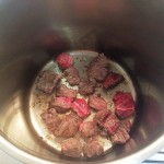 Browning meat in a saucepan