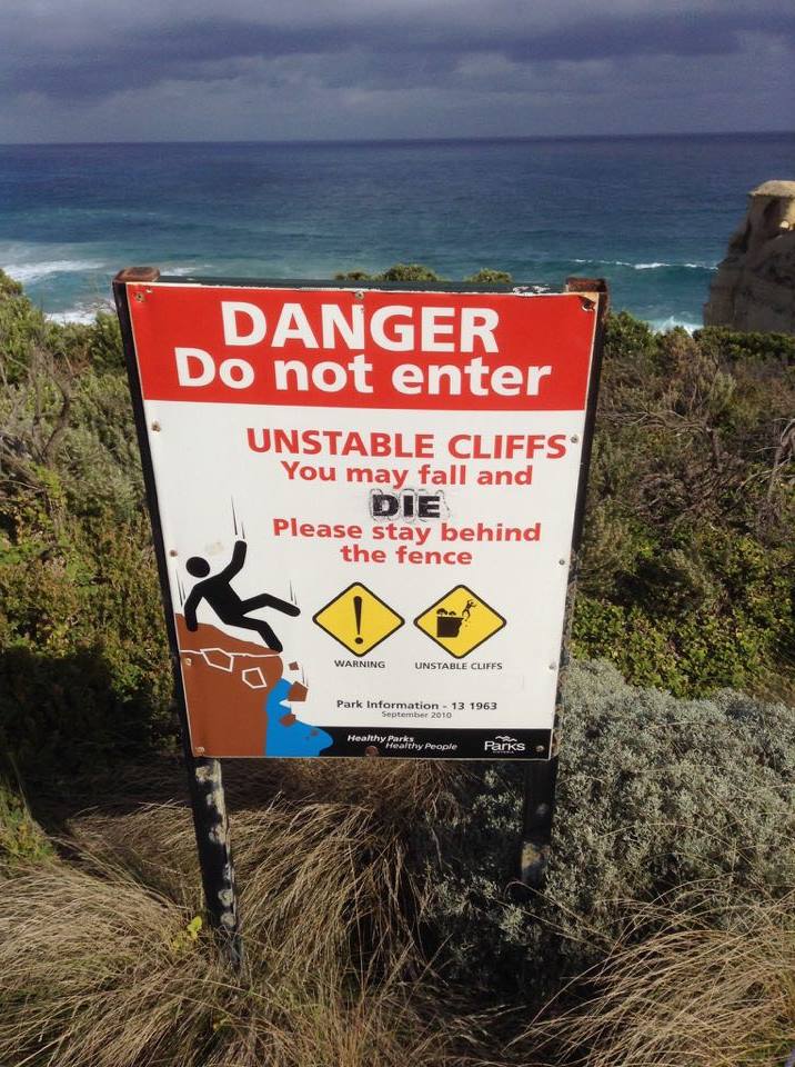 Image of warning sign at a cliff that reads, Danger Do no enter with image of stick person sliding down cliff face.