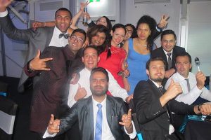 Group of CISA conference delegates pose for fun photo at conference dinner.