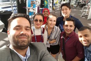 Delegates pose for a selfie inbetween networking.