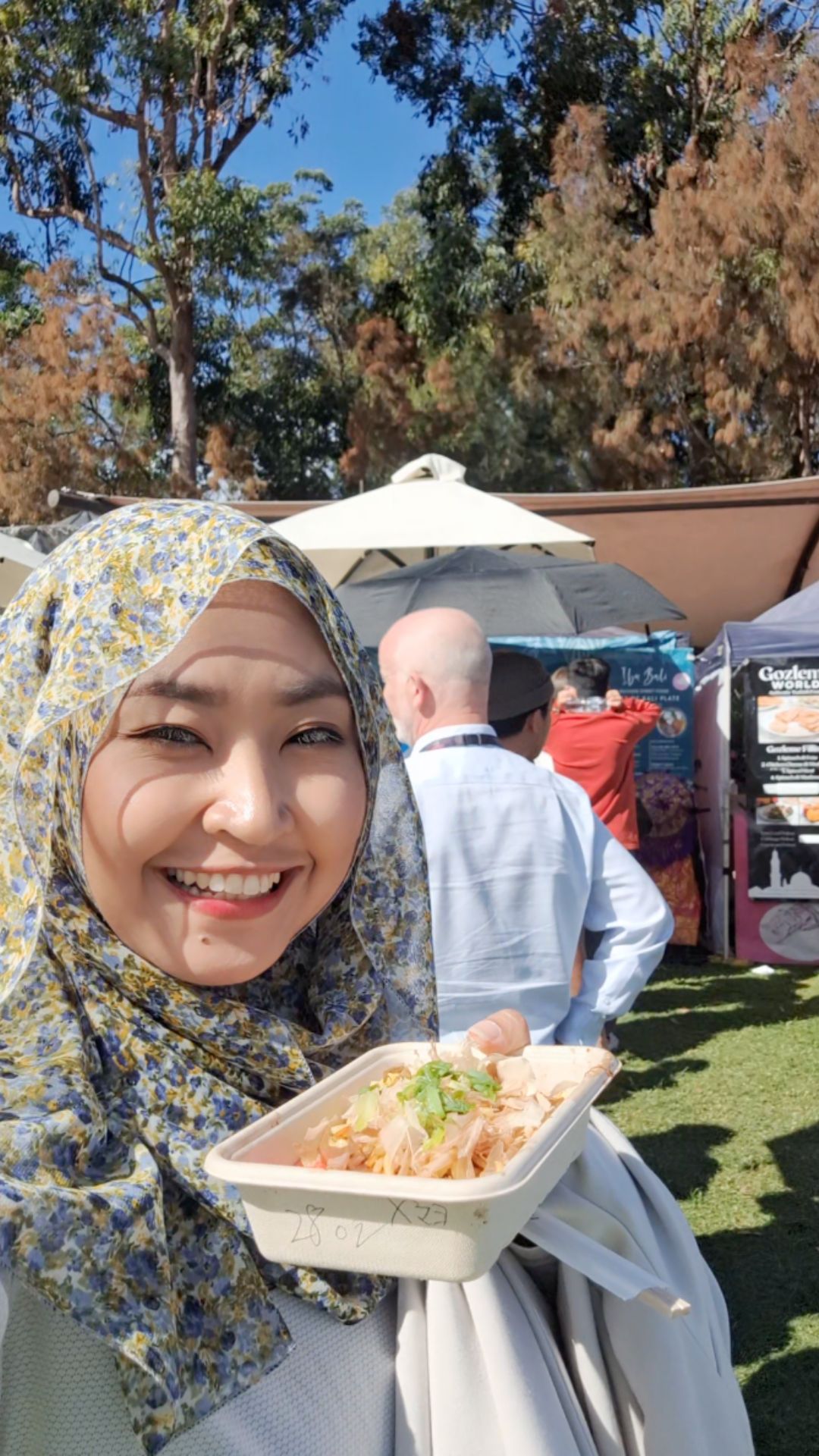 Enjoying some Indonesian food at the campus Market Day.