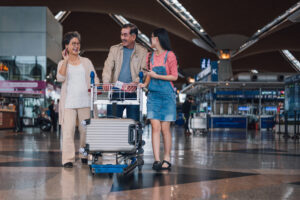 Daughter meeting parents at airport.